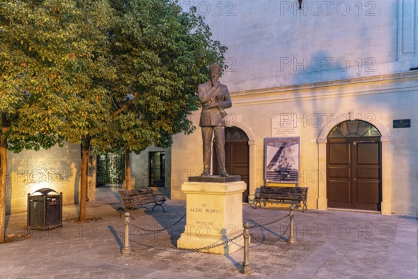 Monument to the politician Aldo Moro at dusk, Maglie, Apulia, Italy