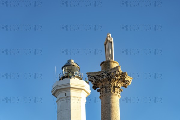 Marian column and lighthouse in Santa Maria di Leuca, Apulia, Italy