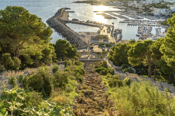 View of the Roman Column Colonna Romana, Scalinate Monumentale and the Marina Porto Turistico in Santa Maria di Leuca, Apulia, Italy