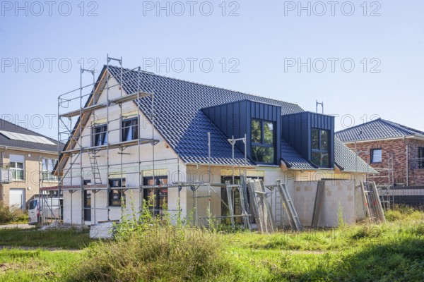 Scaffolded shell of a residential building, single-family house, Hoya, Lower Saxony, Germany