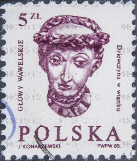 Wawel Head – Renaissance sculptures of wooden heads adorning the ceiling of the Ambassadors' Hall at the Wawel Royal Castle in Krakow. The ceiling's significance is allegorical, with the heads representing figures of various social standing, such as kings, soldiers, and courtiers. Portrait on Polish postage stamp