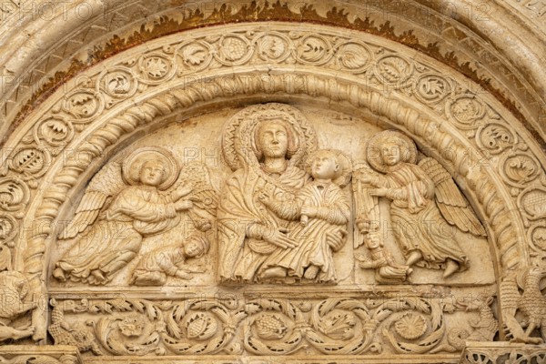 Relief above the portal of the church of Santa Maria Maggiore in Monte Sant'Angelo, Gargano, Apulia, Italy