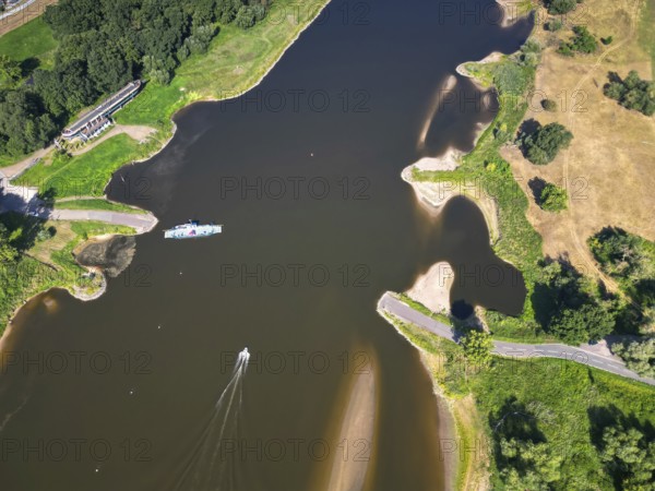 DefaultAerial view, Elbe, yaw ferry, shipping, reed bed, ferry connection, ferry, foggy mood, sunrise, biotope, habitat, motorboat, holiday destination, Germany from above, sandbanks, dryness, low water, drought, climate change, Elbe cycle path, tourism, Elbe floodplains, floodplain landscape, river course, delta, Middle Elbe river landscape, flowing water, sunrise, Middle Elbe biosphere reserve, Saxony-Anhalt, Germany
