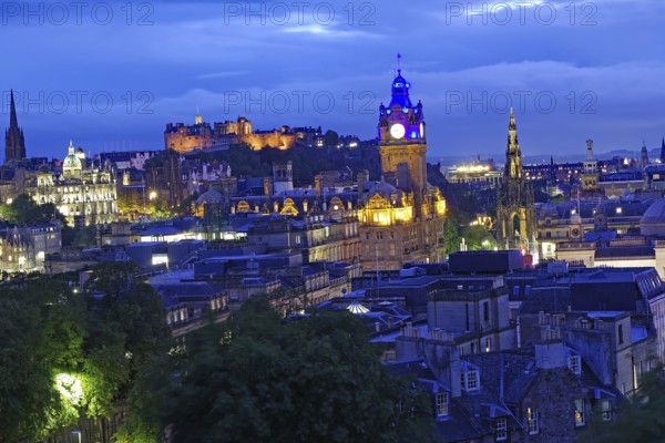 Edinburgh at dusk with illuminated landmarks and a vibrant skyline, Old Town, Calton Hill, Edinburgh, Scotland, United Kingdom