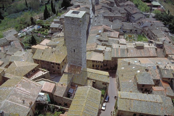 Roofscape and a gender tower of San Gimignano, Toakana, Italy