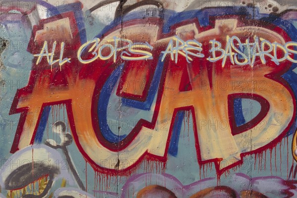 Graffiti on the Berlin Wall created in the 1990s, Berlin, Germany