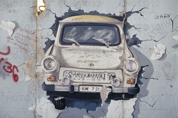 Painting of a Trabbi in the 1990s created at the Berlin Wall, Berlin, Germany