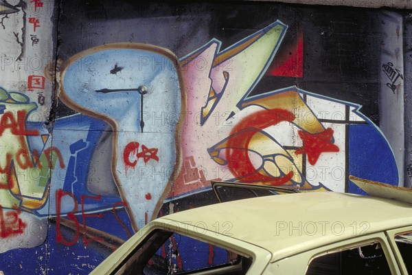 Painting at the Berlin Wall, created in the 1990s, Berlin, Germany