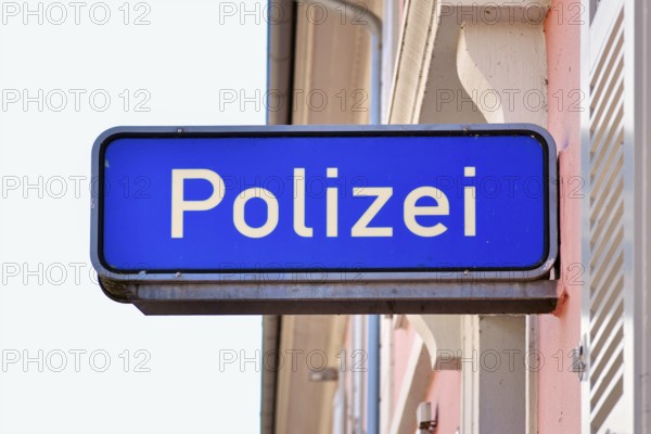 Ettlingen, Germany - August 13th 2025: German police sign with the word Polizei on building