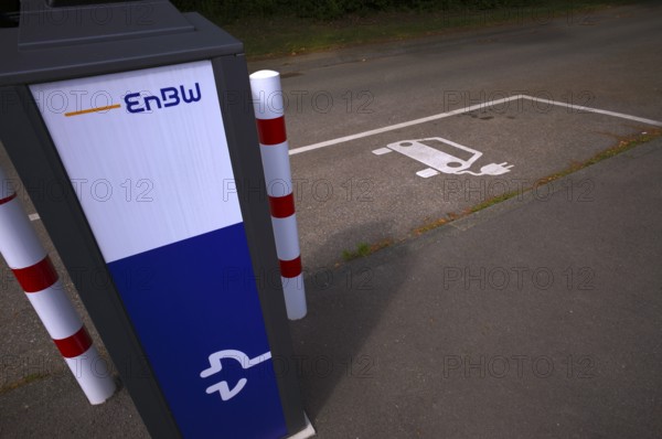 Car park with EnBW charging station for electric cars, charging station, e-charging station, e-mobility, empty, free, unused, without e-car, pictogram, logo, Stuttgart, Baden-Württemberg, Germany