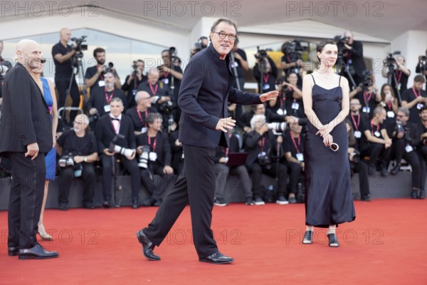 Venice, Italy - 1 September 2025: Sebastian Koch and Julia Windischbauer (r.) on the red carpet of - The Smashing Machine - during the 82nd Venice International Film Festival