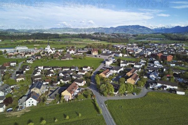 View of the village with the neighbourhood Oberdorf and the catholic parish church Mariä Geburt, Sins, Freiamt, Canton, Aargau, Switzerland