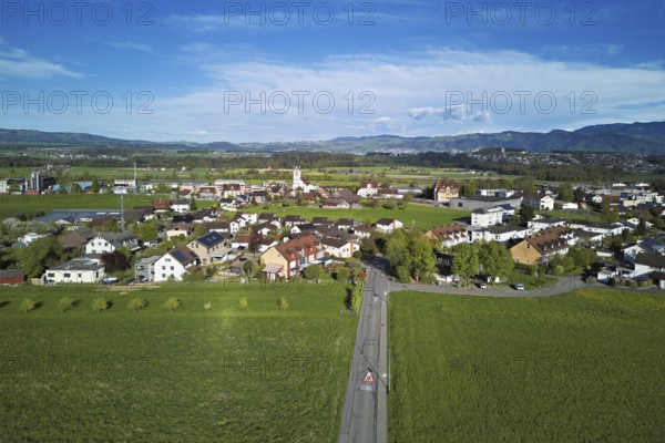 View of the village with the neighbourhood Oberdorf and the catholic parish church Mariä Geburt, Sins, Freiamt, Canton, Aargau, Switzerland