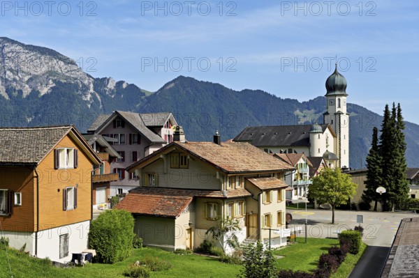 View of the village with the parish church of St Michael, Seelisberg, Canton, Uri, Switzerland