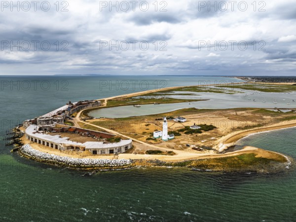 Hurst Point Lighthouse and Hurst Castle from drone over Hurst Spit, Milford on Sea, Lymington, Hampshire, England, United Kingdom