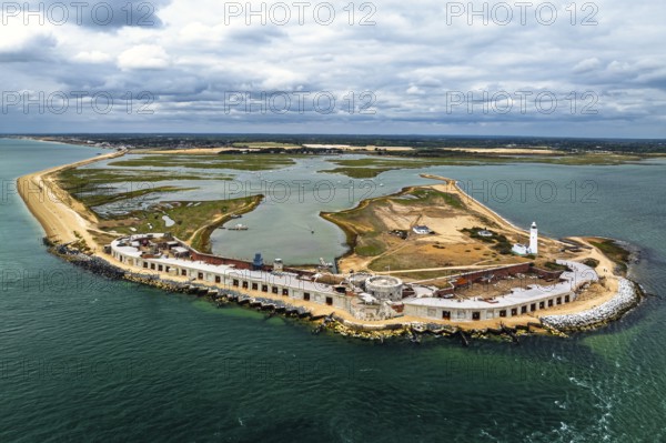 Hurst Point Lighthouse and Hurst Castle from drone over Hurst Spit, Milford on Sea, Lymington, Hampshire, England, United Kingdom
