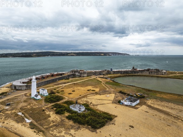 Hurst Point Lighthouse and Hurst Castle from drone over Hurst Spit, Milford on Sea, Lymington, Hampshire, England, United Kingdom