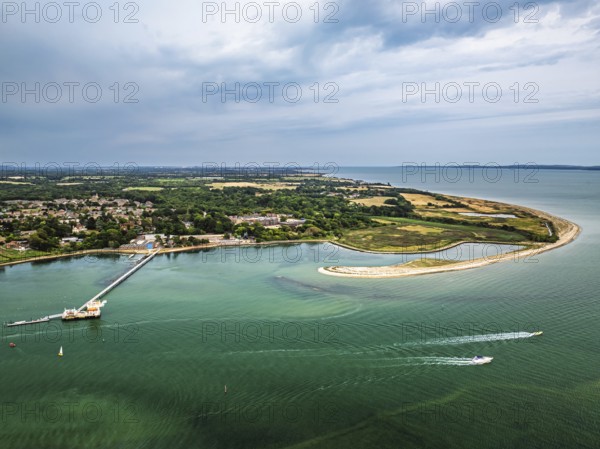River Hamble over Warsash Maritime Academy Pier from drone, Hamble-le-Rice, Warsash, Southampton Water, Hampshire, England, United Kingdom