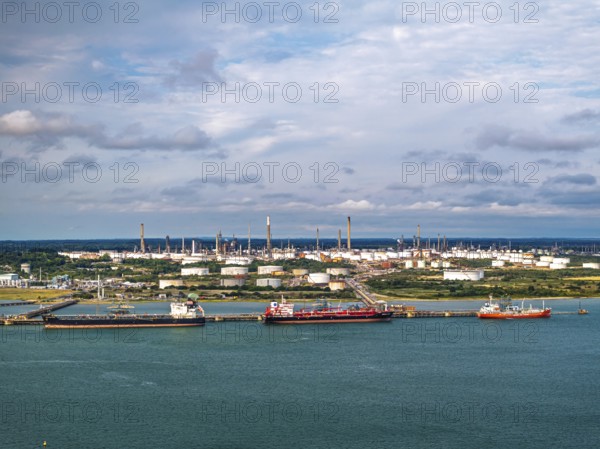 Gas tankers over refinery Esso Oil Terminal from drone, Southampton, Hampshire, England, United Kingdom