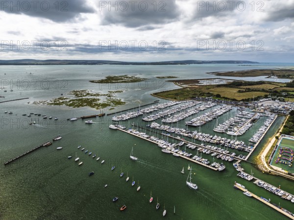 Lymington River and marina from drone, Lymington, New Forest, Hampshire, England, United Kingdom