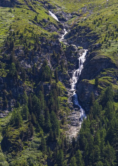 Waterfall cascading over rocks, near Zinal, Val d'Anniviers, Valais Alps, Canton Valais, Switzerland