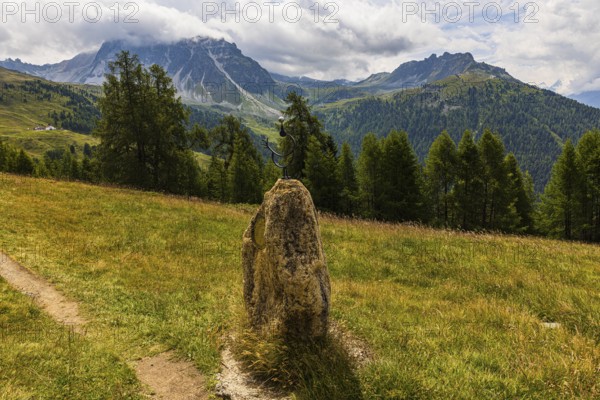 Planetary path, here the motif stone for the planet Mercury, above Saint Luc, Val d'Anniviers, Valais Alps, Canton Valais, Switzerland