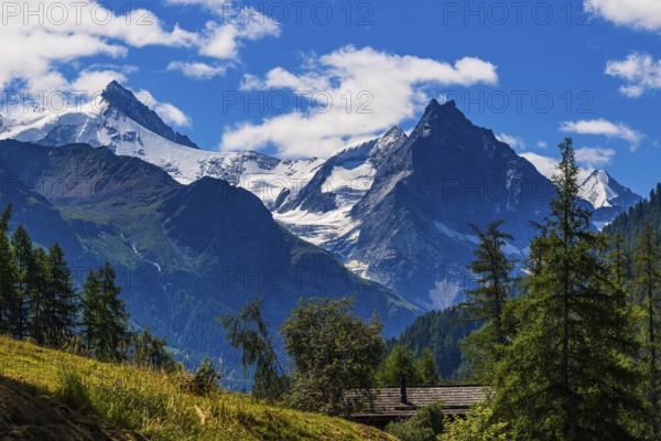 The Zinalrothorn and Besso mountains with their twin peaks, view from Ayer, Val d'Anniviers, Valais Alps, Canton Valais, Switzerland