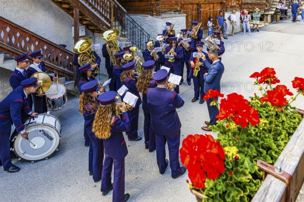 The brass band Echo des Alpes plays at the musicians' meeting in Mission, Val d'Anniviers, Valais Alps, Canton Valais, Switzerland