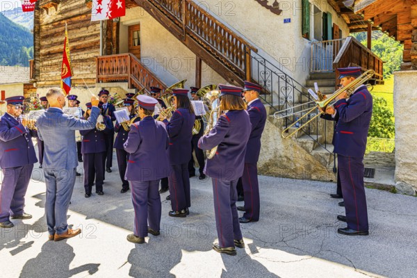 The brass band Echo des Alpes plays at the musicians' meeting in Mission, Val d'Anniviers, Valais Alps, Canton Valais, Switzerland
