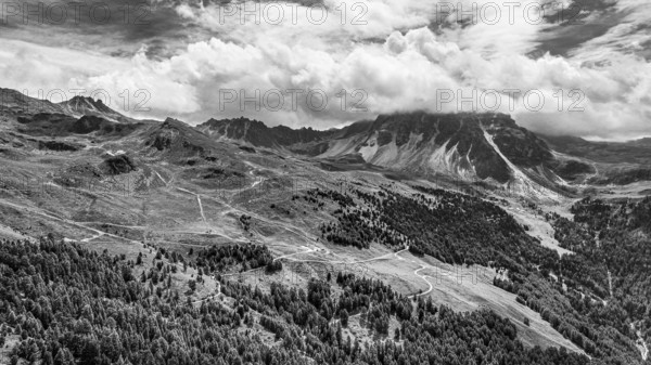 The summit of the Weisshorn enveloped in clouds, alpine pastures above Saint Luc, drone shot, black and white images, Val d'Anniviers, Valais Alps, Canton Valais, Switzerland