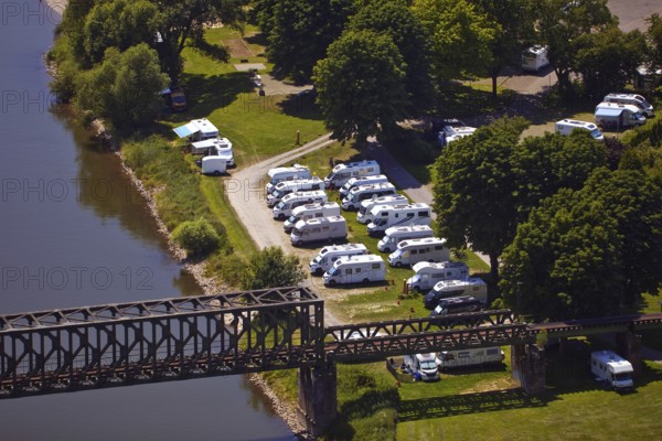 Elevated view from Eckberg to a motorhome parking area on the River Weser, Bodenwerder, Münchhausenstadt, Lower Saxony, Germany