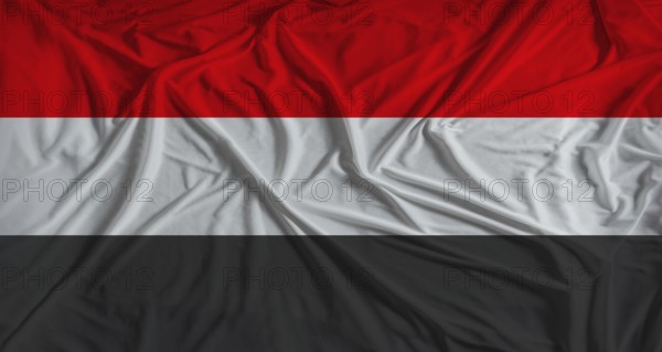 Yemeni flag with fabric texture background. National flag of Yemen with cloth texture