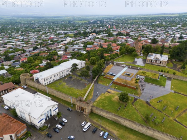 Historic walls and buildings with neighbouring trees in an urban environment, aerial view, bank building, school, museum and royal palace, Batonis Ziche, Batonistsikhe, royal fortress, Telavi, Telavi, Kakheti region, Georgia
