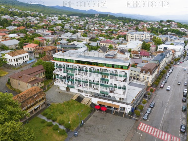 Modern buildings and streets with parked cars in a neighbourhood under a cloudy sky, aerial view, Telavi, Telavi, Kakheti region, Georgia