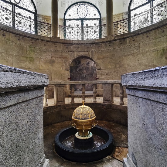 Sacred atmosphere, spa fountain in the fountain temple of the drinking spa complex, healing spring emerging from the golden ball, Bad Nauheim, Hesse, Germany