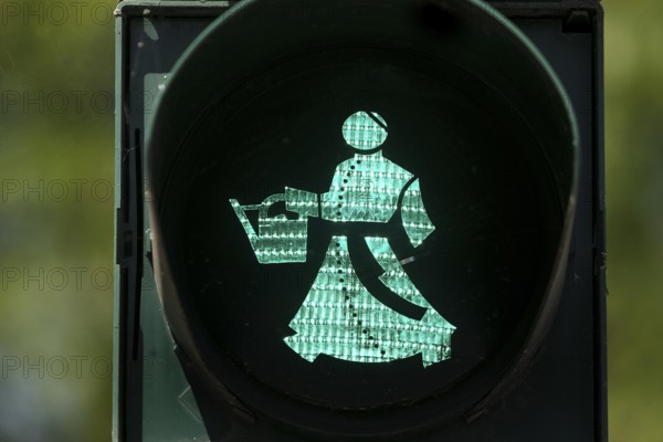 Traffic light man with Sebastian Kneipp, pedestrian traffic light with water doctor in the green phase, Bad Nauheim, Hesse, Germany