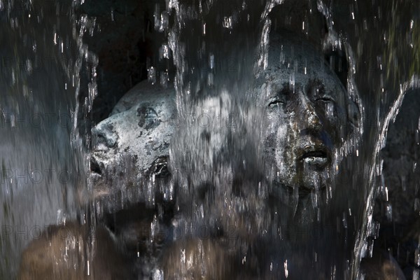 Fountain of Knowledge by Heinrich Jobst, close-up in the large spa gardens of Bad Nauheim, Hesse, Germany