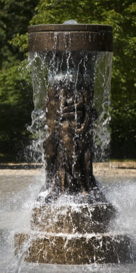 Fountain of Knowledge by Heinrich Jobst in the large spa gardens of Bad Nauheim, Hesse, Germany