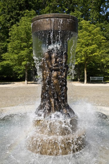 Fountain of Knowledge by Heinrich Jobst in the large spa gardens of Bad Nauheim, Hesse, Germany