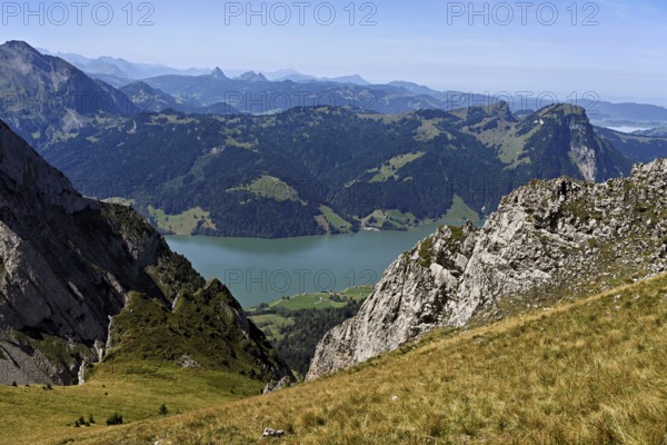 View from Bockmattli to the Wägitalersee, behind the small and large Aubrig, Innerthal, Canton, Schwyz, Switzerland
