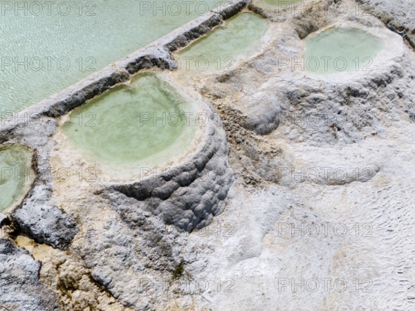 Close-up of small limestone pools with clear water basins, aerial view, Akkaya Travertines, Bolu Province, Turkey