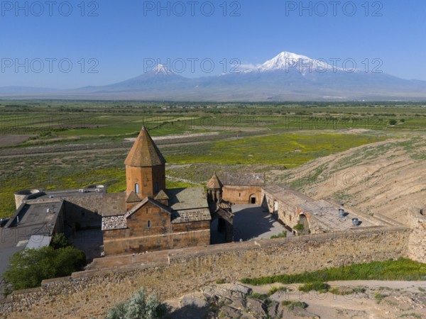 Monastery complex with a view of Mount Ararat and the surrounding landscape, aerial view, Chor Wirap monastery, Chor Virap, deep dungeon, Mount Ararat and Little Ararat in the background, located in Turkey, Ararat province, Armenia