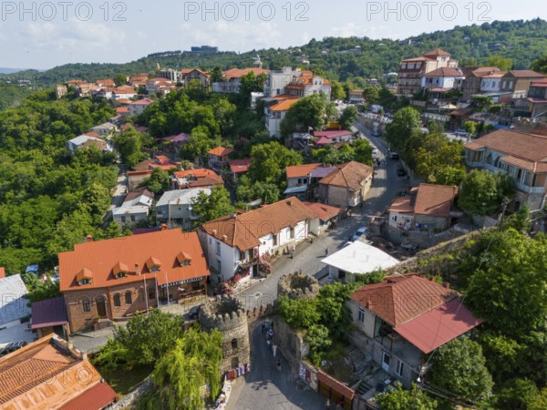 Picturesque village with characteristic red roofs, surrounded by green vegetation and small streets, aerial view, city gate, Sighnaghi, Signagi, Kakheti Province, Greater Caucasus, Georgia, Near East