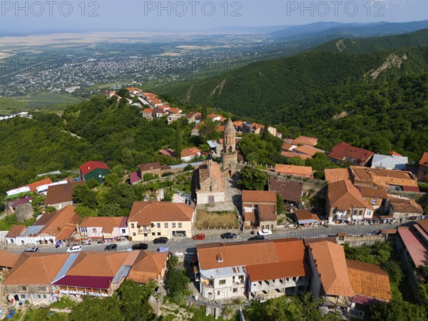 Panorama of a hilly town with a central church and traditional roofs, aerial view, Sighnaghi, Signagi, Kakheti Province, Greater Caucasus, Georgia, Near East