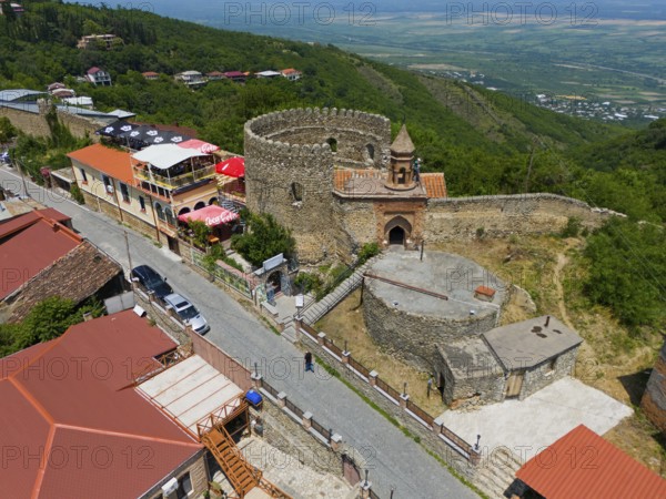 Historic castle with surrounding traditional buildings on a hill, aerial view, Sighnaghi, Signagi, Kakheti Province, Greater Caucasus, Georgia, Near East