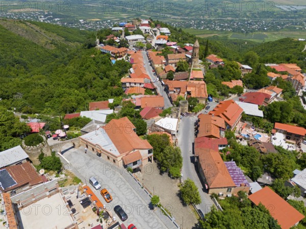 Hilly street view with traditional buildings and panoramic distant view, aerial view, Sighnaghi, Signagi, Kakheti Province, Greater Caucasus, Georgia, Near East