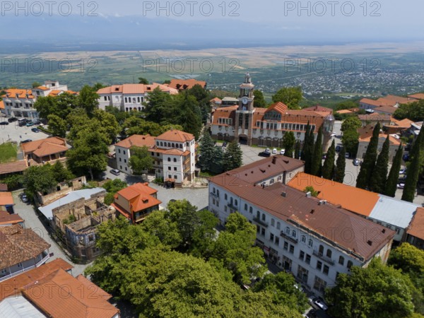 Panoramic view of a town with a prominent tower and traditional red roofs, aerial view, Sighnaghi, Signagi, Kakheti Province, Greater Caucasus, Georgia, Near East