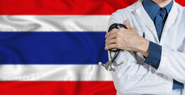 Doctor with stethoscope on Thailand flag. Doctor holding stethoscope on Thailand flag