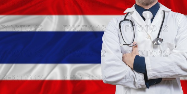 Male doctor with stethoscope on Thai flag. Doctor holding stethoscope on Thailand flag