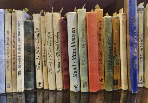 Books about Münchhausen in the Münchhausen Museum, Münchhausen town of Bodenwerder, Weserbergland, Lower Saxony, Germany